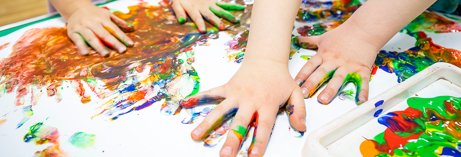 Kids playing with paint